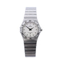Omega Constellation stainless steel watch with beige dial, Roman numeral bezel, black hands, baton hour markers, and integrated bracelet strap on white background.