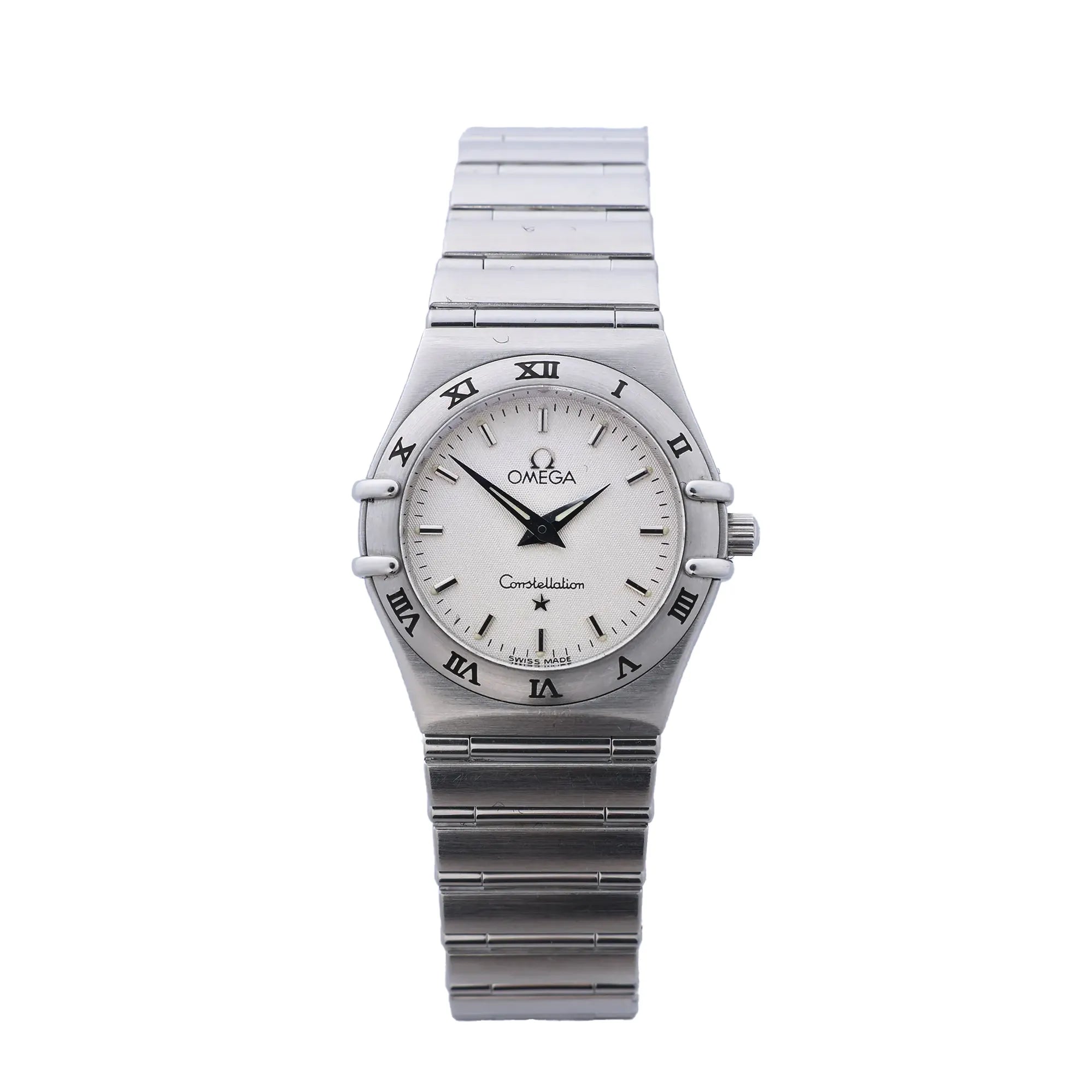 Omega Constellation stainless steel watch with beige dial, Roman numeral bezel, black hands, baton hour markers, and integrated bracelet strap on white background.
