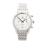 Front view of Omega De Ville Co-Axial stainless-steel watch with white dial, applied Roman numerals, two subdials, date window at 6 o’clock, and steel bracelet.