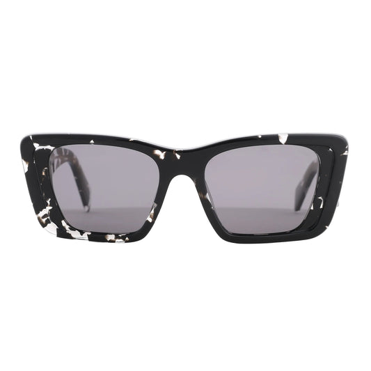 Prada PR 08Y Cat Eye-Frame Sunglasses in black acetate with white marbled detailing, featuring sharp angular corners and dark tinted lenses, displayed front-facing against a white background.