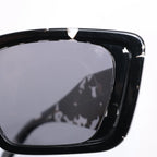 Prada Cat Eye-Frame Sunglasses in Black PR 08Y