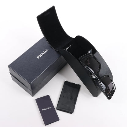 Lunettes de soleil Prada œil de chat noires PR 08Y