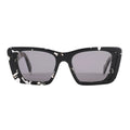 Prada PR 08Y Cat Eye-Frame Sunglasses in black acetate with white marbled detailing, featuring sharp angular corners and dark tinted lenses, displayed front-facing against a white background.