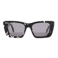 Prada PR 08Y Cat Eye-Frame Sunglasses in black acetate with white marbled detailing, featuring sharp angular corners and dark tinted lenses, displayed front-facing against a white background.