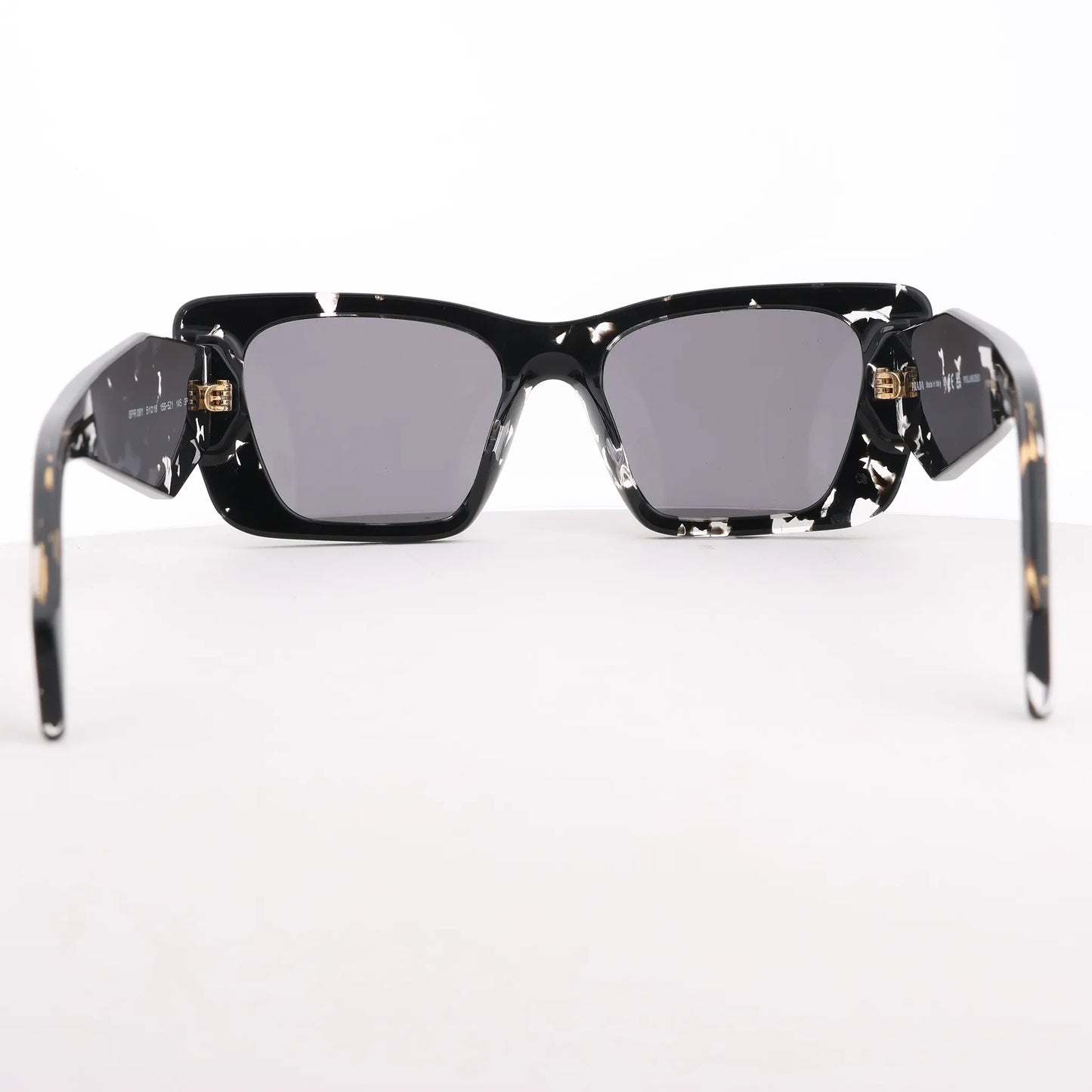 Lunettes de soleil Prada œil de chat noires PR 08Y