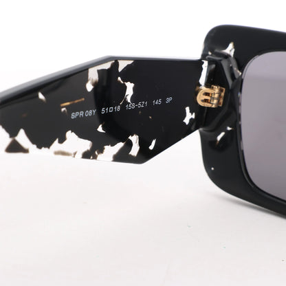 Lunettes de soleil Prada œil de chat noires PR 08Y