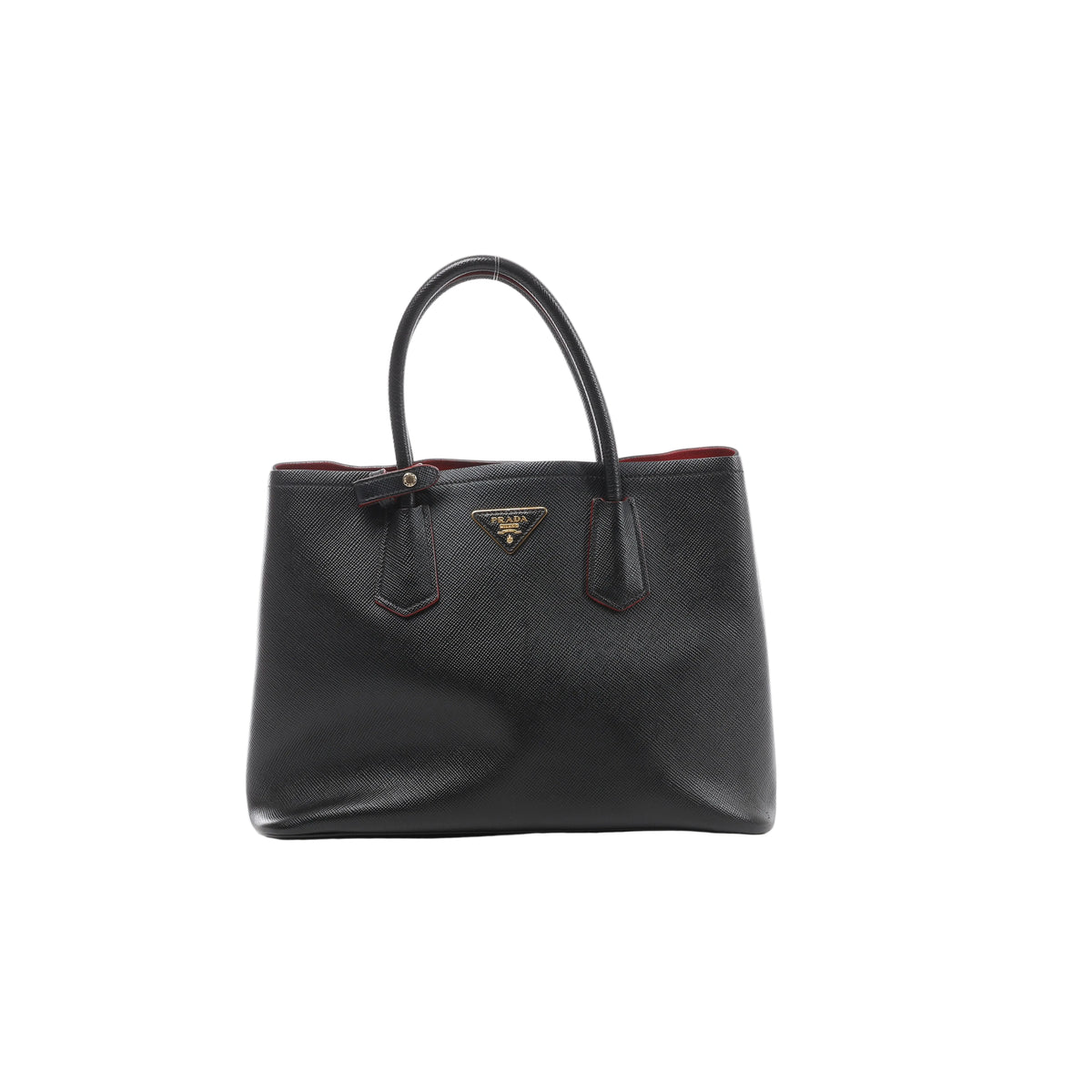 Front view of Prada Cuir black Saffiano leather handbag with twin rounded handles, red edging and a gold-tone triangular Prada logo.