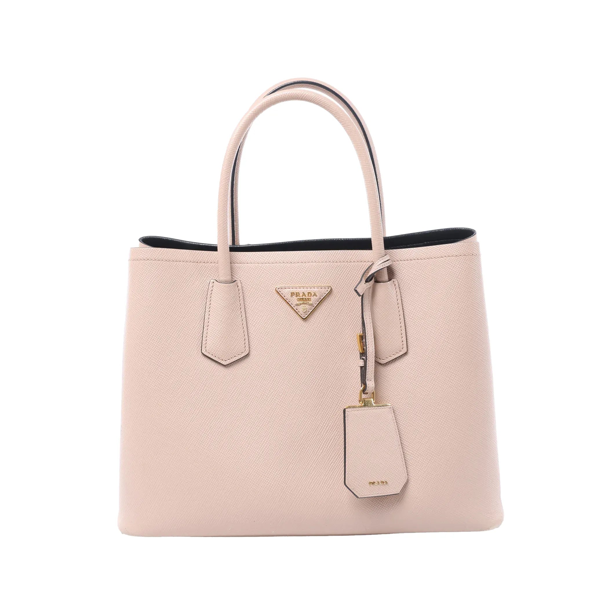 Front view of a pink Prada Double Saffiano leather handbag with dual top handles, gold-tone triangle logo and matching leather tag.