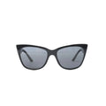 Prada SPR 23X sunglasses with black cat-eye front frame, gray tinted lenses, white side panels and black temples on white background.