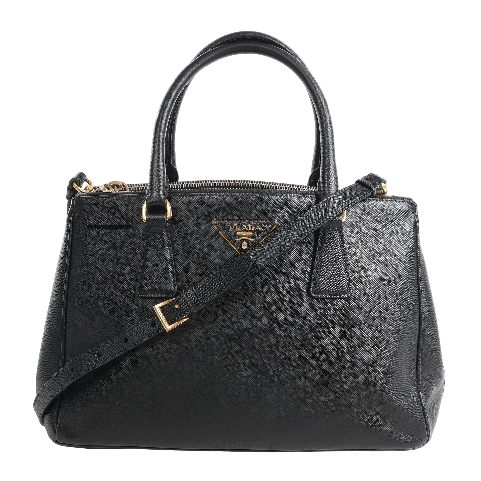 Prada Galleria Saffiano Lux Leather 2Way Handbag in black, featuring textured leather, gold-tone hardware, top handles, detachable shoulder strap, and signature Prada triangle logo plaque on the front.
