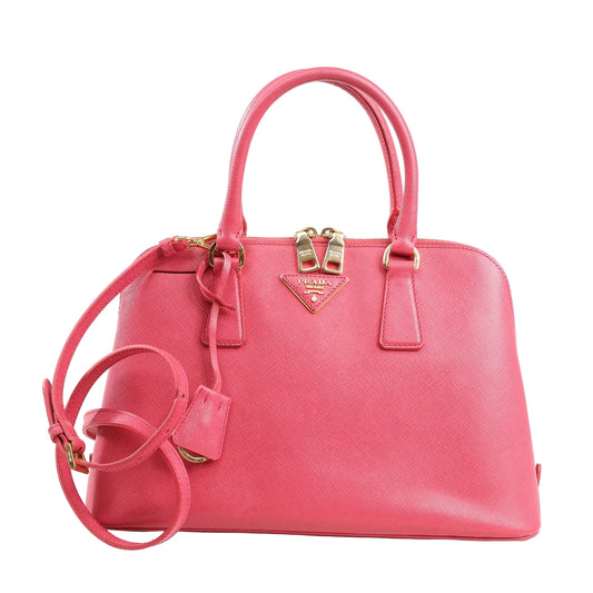 Prada Promenade 2Way Handbag BL0837 in pink Saffiano Lux leather with top handles, detachable shoulder strap, gold-tone hardware, and triangle logo plaque on a white background.
