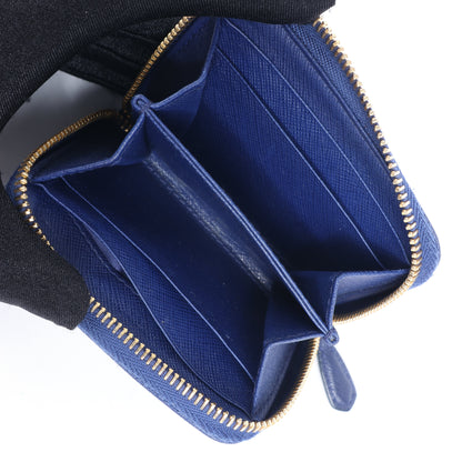 Portefeuille Prada Saffiano Metal 1MM268 en cuir bleu