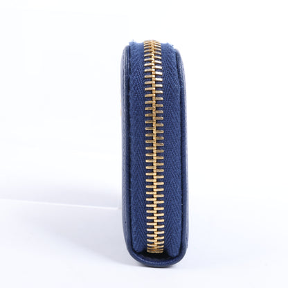 Portefeuille Prada Saffiano Metal 1MM268 en cuir bleu