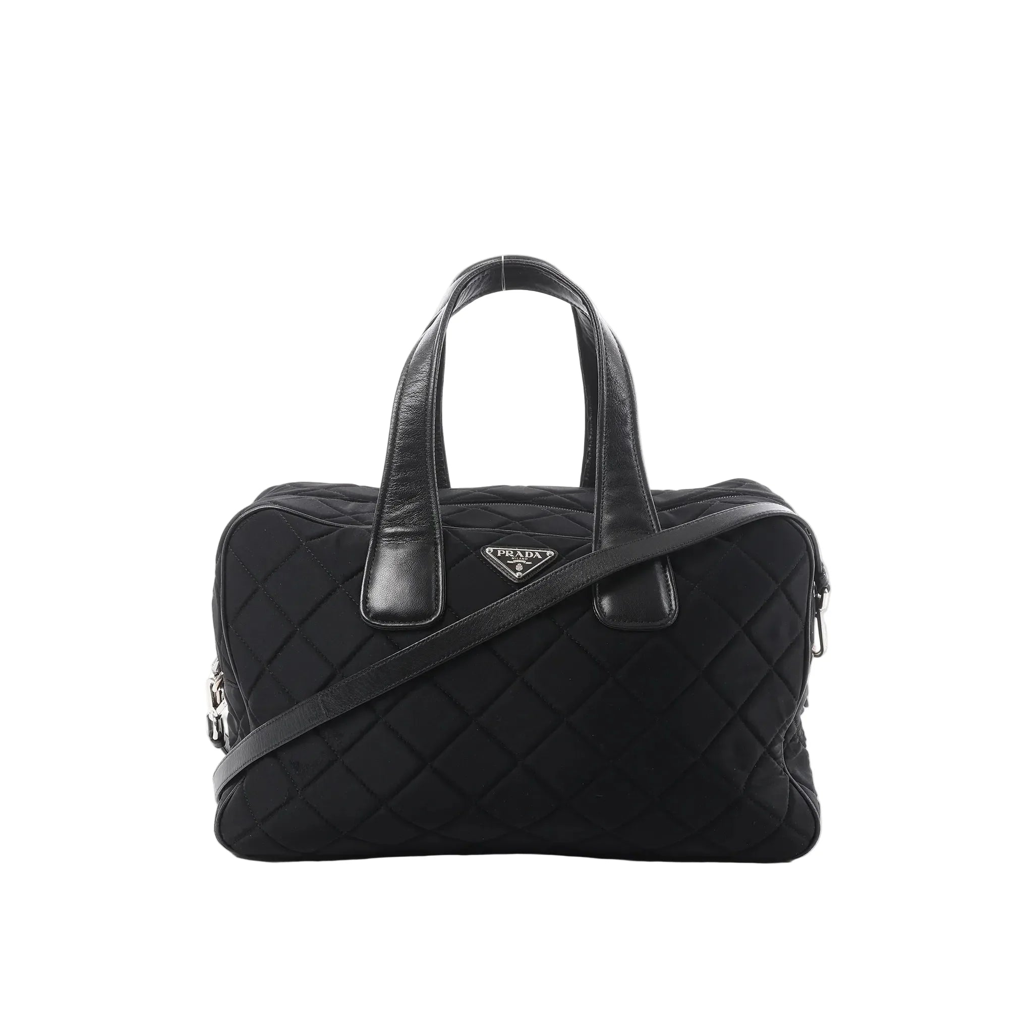 Prada black quilted nylon handbag with leather top handles, detachable shoulder strap, zip closure, and triangular Prada logo plaque on a white background.