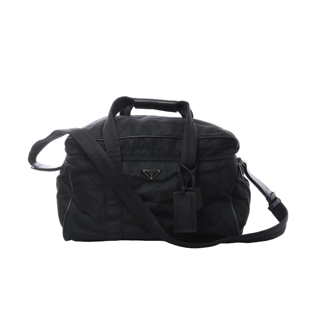 Prada Tessuto black nylon and leather 2-way handbag with dual top handles, detachable shoulder strap, front zip pocket and Prada triangle logo plaque.