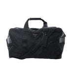 Front view of Prada black Tessuto nylon duffel bag with webbing handles, detachable shoulder strap, leather trim panels, and Prada triangle logo plaque.