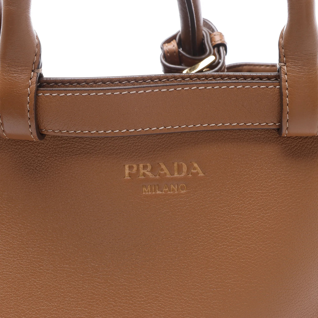 Prada Buckle Soft Grain Leather Small Handbag in Brown