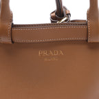 Prada Buckle Soft Grain Leather Small Handbag in Brown