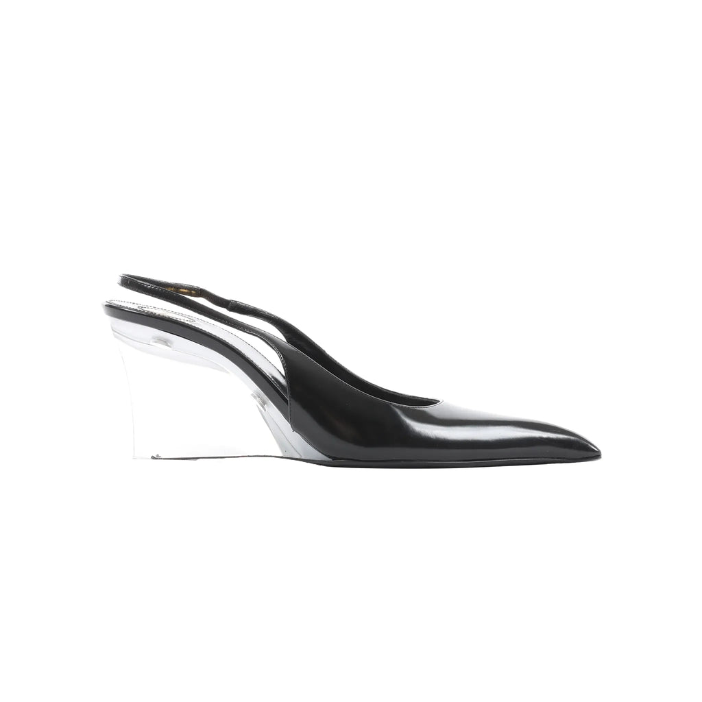 Side view of Saint Laurent black leather slingback heel with pointed toe and transparent wedge heel.