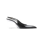 Side view of Saint Laurent black leather slingback heel with pointed toe and transparent wedge heel.