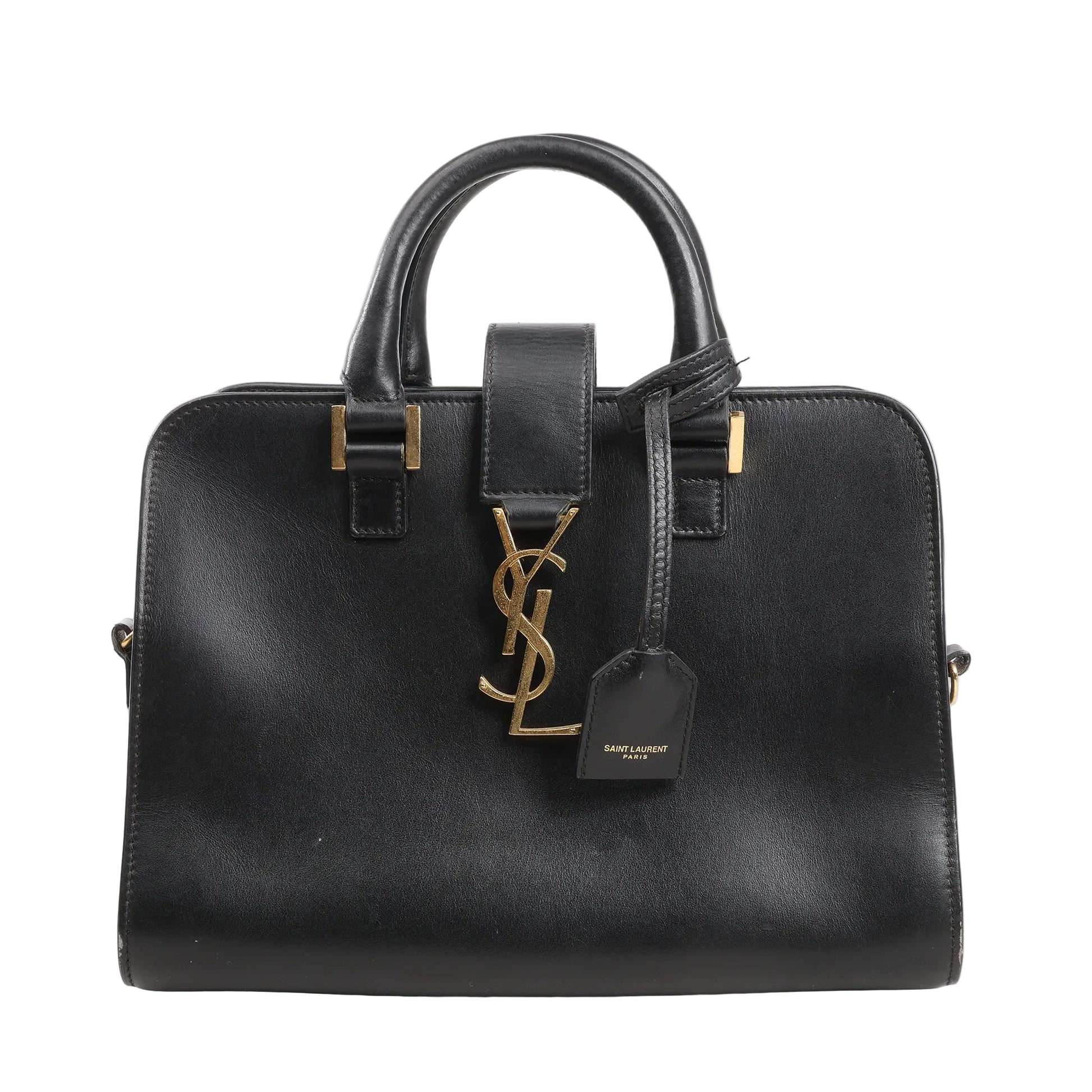 Saint Laurent Paris Baby Cabas handbag in smooth black leather with structured top handles, gold YSL logo hardware, and leather luggage tag.