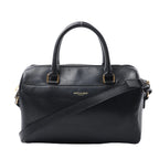 Saint Laurent Baby Duffle black leather handbag with rolled top handles, detachable shoulder strap, gold-tone hardware and top zip closure.