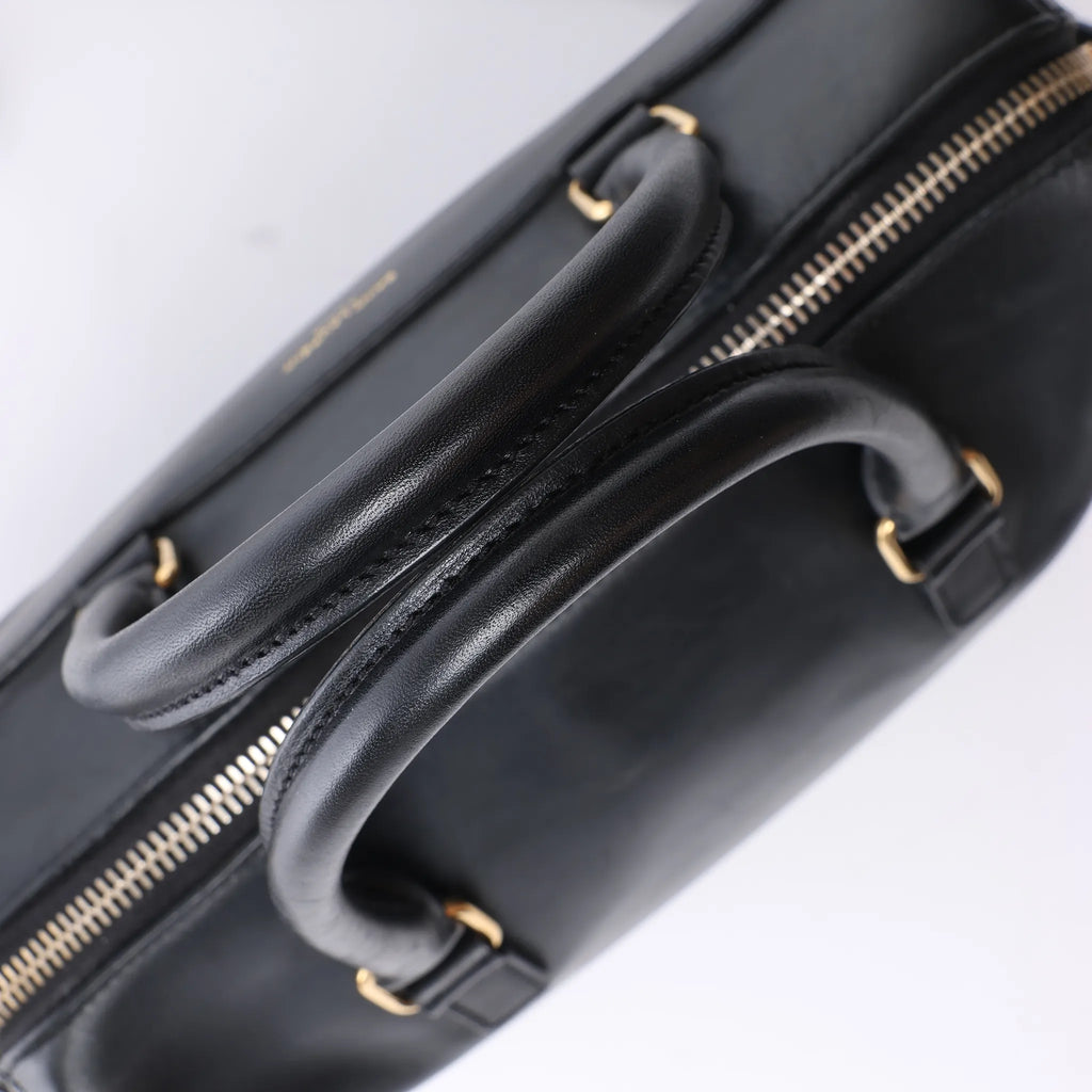 Bolso de mano Saint Laurent Paris Duffle Baby de cuero negro de 2 vías 330958