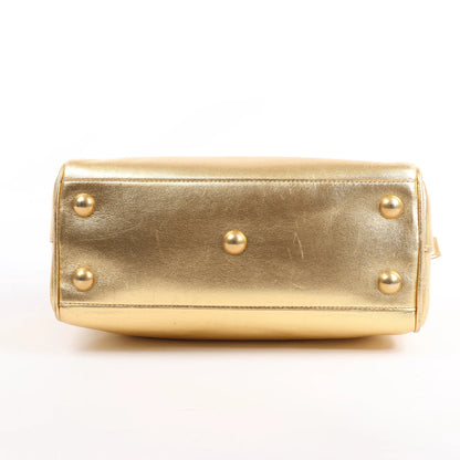 Sac à main double usage en cuir Saint Laurent Paris Baby Duffle, doré 330958