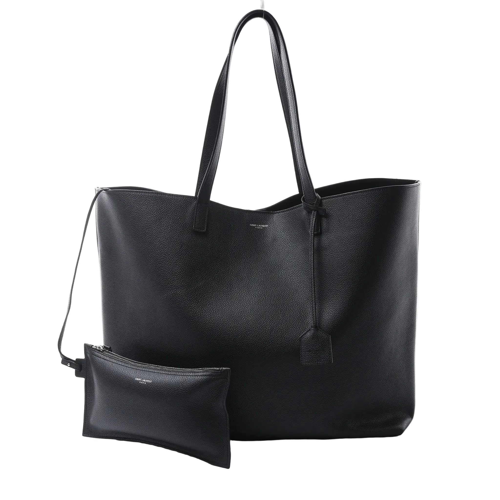 Saint Laurent black grained leather shopping tote with long shoulder straps, silver-tone logo, leather tag and detachable zip pouch.