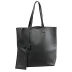 Gray Saint Laurent Bold grainy leather tote bag with long shoulder straps, small front logo and coordinating hanging zip pouch.