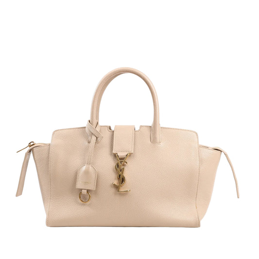 Saint Laurent Paris Downtown Cabas 2Way Handbag 635346 in beige pebbled leather with gold YSL logo, top handles, side gussets, and leather key ring against a white background.