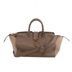 Beige Saint Laurent Downtown Cabas leather and suede handbag with top handles, shoulder strap, gold-tone YSL logo and zip side compartments.