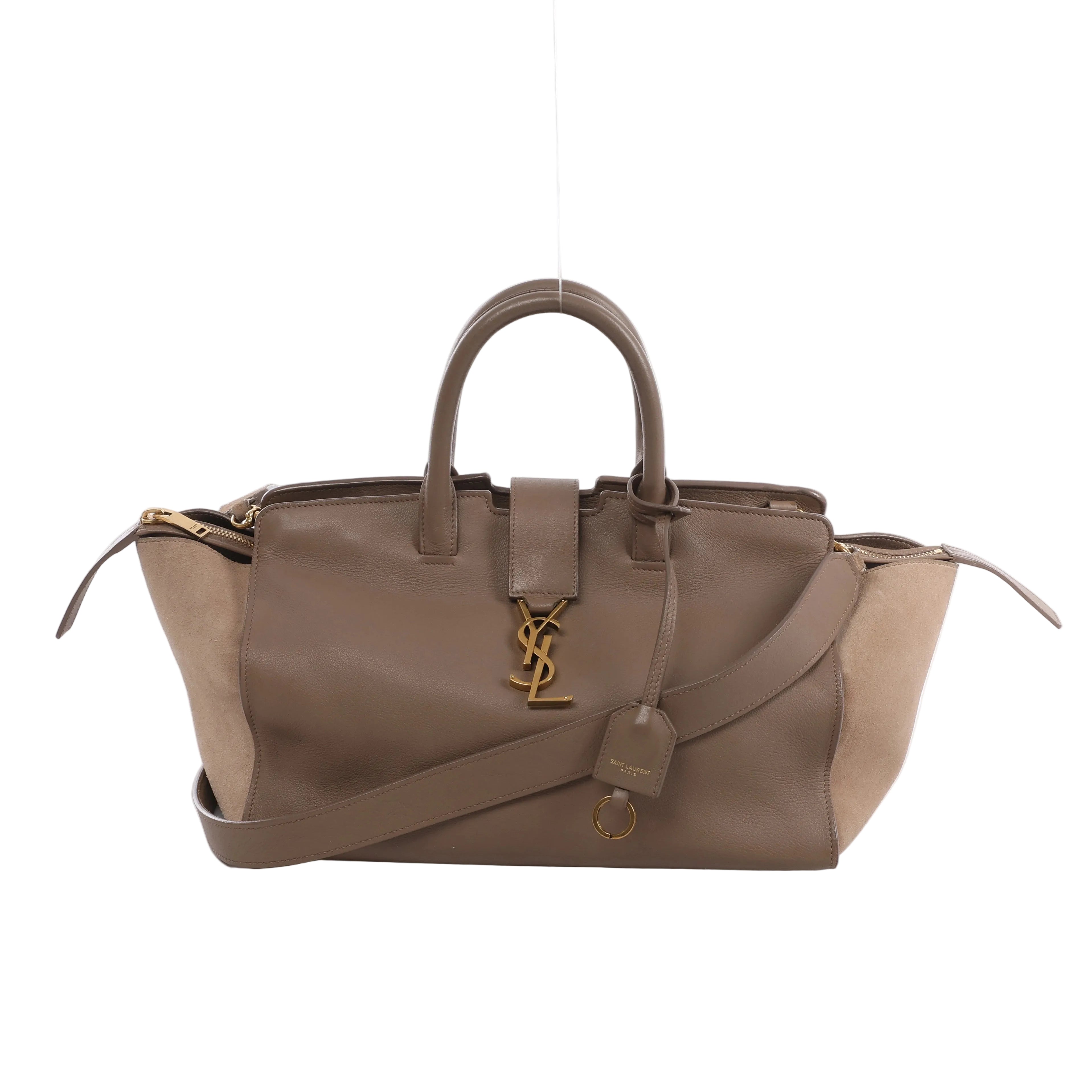 Beige Saint Laurent Downtown Cabas leather and suede handbag with top handles, shoulder strap, gold-tone YSL logo and zip side compartments.