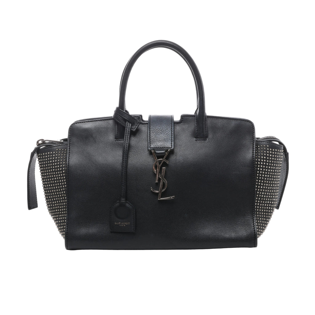 Black Saint Laurent Downtown Cabas leather handbag with silver-tone YSL logo, top handles and studded side panels.