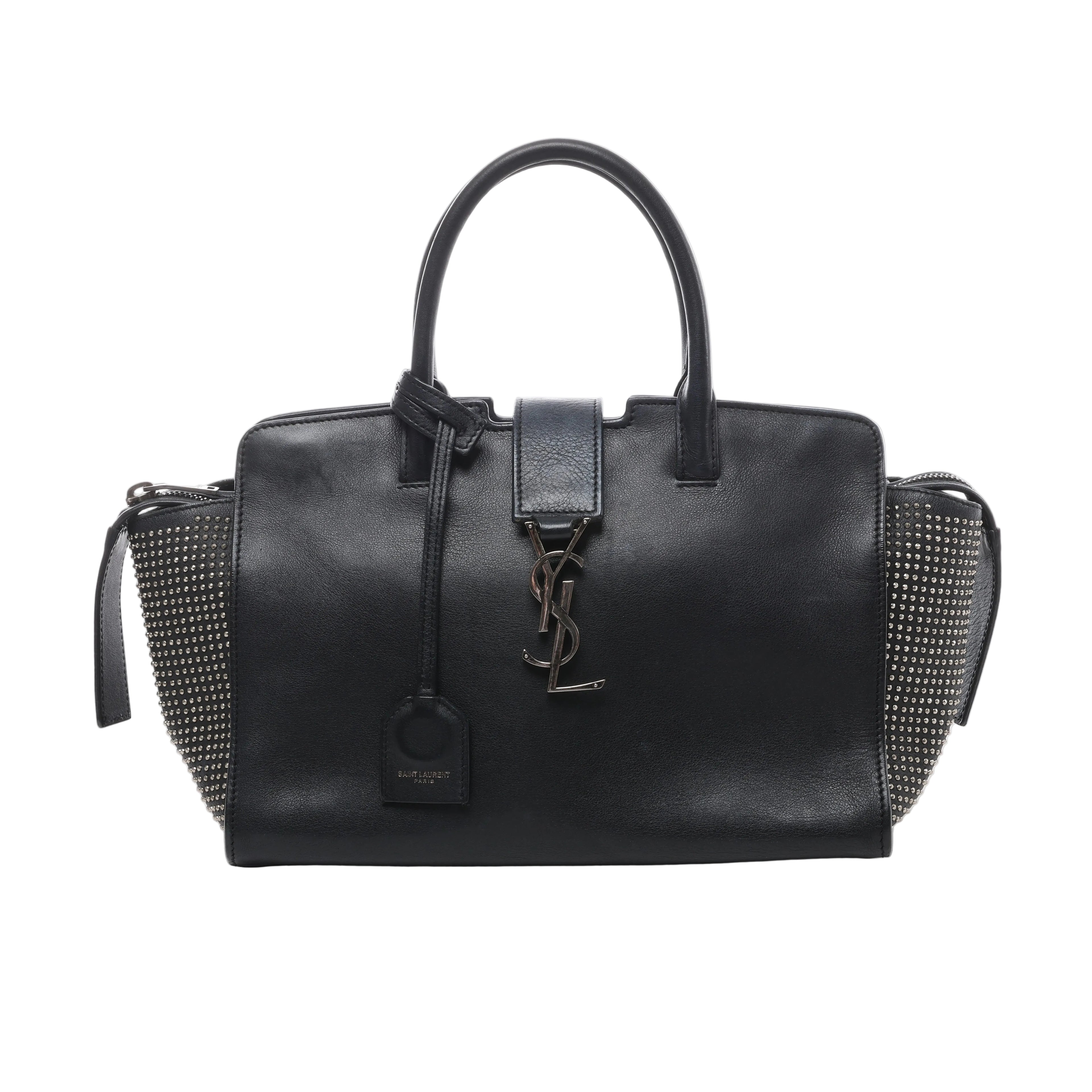 Black Saint Laurent Downtown Cabas leather handbag with silver-tone YSL logo, top handles and studded side panels.