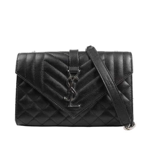 Saint Laurent Paris Envelope Small Crossbody Bag in black grained leather with chevron and diamond quilting, silver YSL monogram, and leather strap.