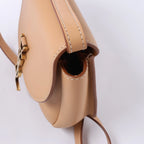 Saint Laurent Paris Kaia Leather Shoulder bag in Beige