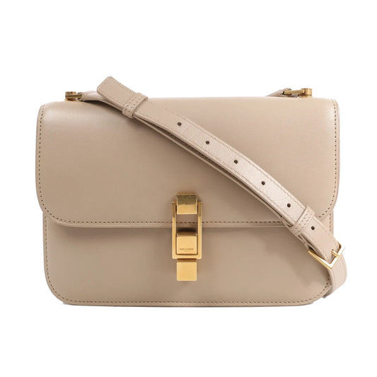 Saint Laurent Paris Carré Leather Shoulder Bag 633214 in beige calfskin, featuring a structured rectangular shape, gold-tone push-lock clasp, and adjustable shoulder strap, displayed against a white background.
