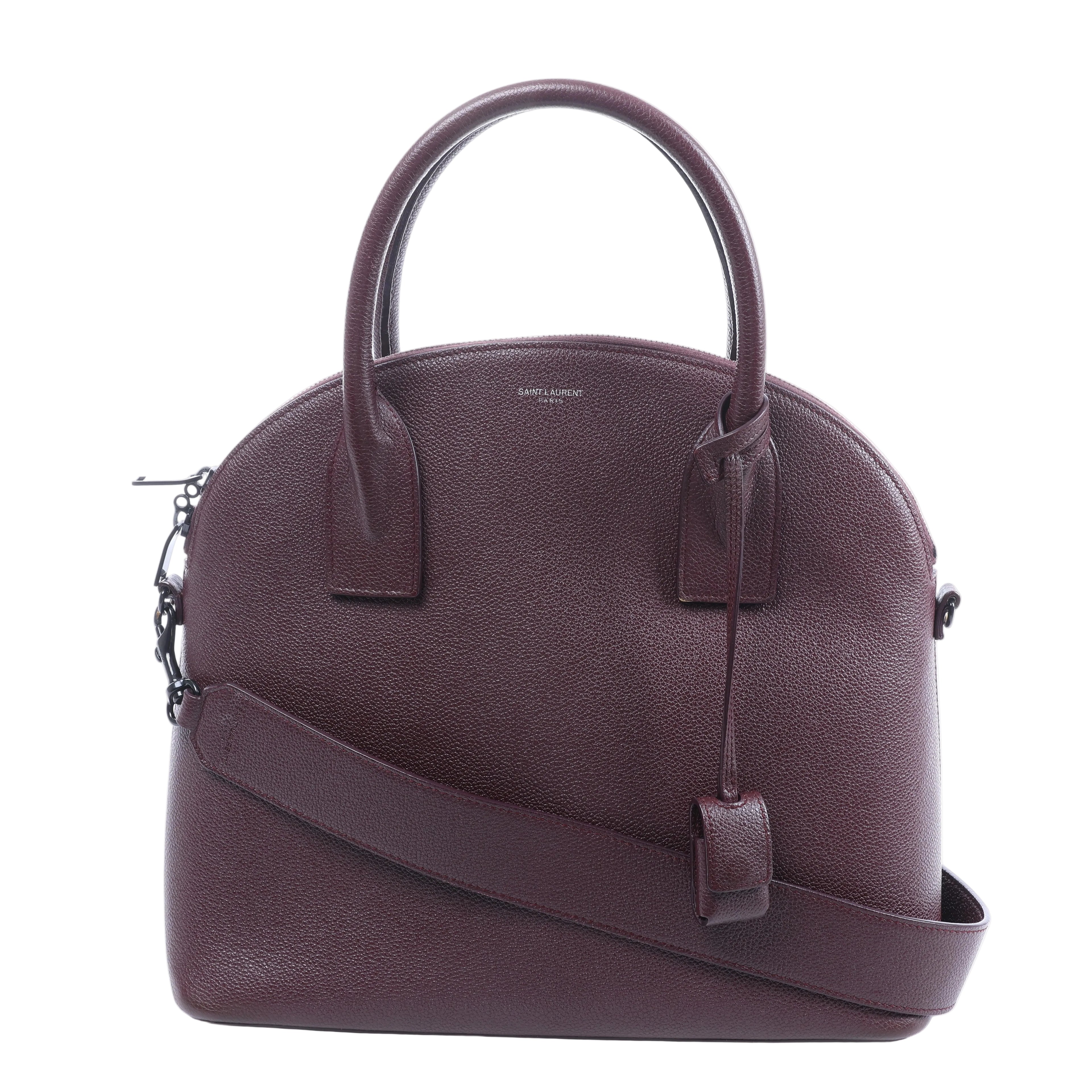 Burgundy Saint Laurent Sac de Jour leather handbag with rounded top handles, matching shoulder strap, zip closure and silver-tone hardware.