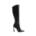 Side view of Saint Laurent Tom black leather knee-high boot with a pointed toe, tall shaft, rear zip and sculpted brown heel.