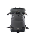 Saint Laurent Livington backpack in dark gray canvas with black leather base, adjustable webbing straps with metal buckles, top handle and front ring detail on white background.