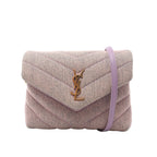 Purple Saint Laurent Loulou canvas shoulder bag with chevron quilting, an envelope flap, gold-tone YSL monogram and lilac leather strap.