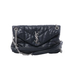 Black Saint Laurent Loulou Puffer leather shoulder bag with chevron quilting, silver-tone YSL logo and chain-and-leather strap.