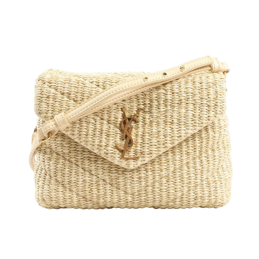 Saint Laurent Paris Loulou Crossbody Bag 467072 in beige raffia with chevron weave, leather strap, envelope flap, and gold YSL logo on a white background.