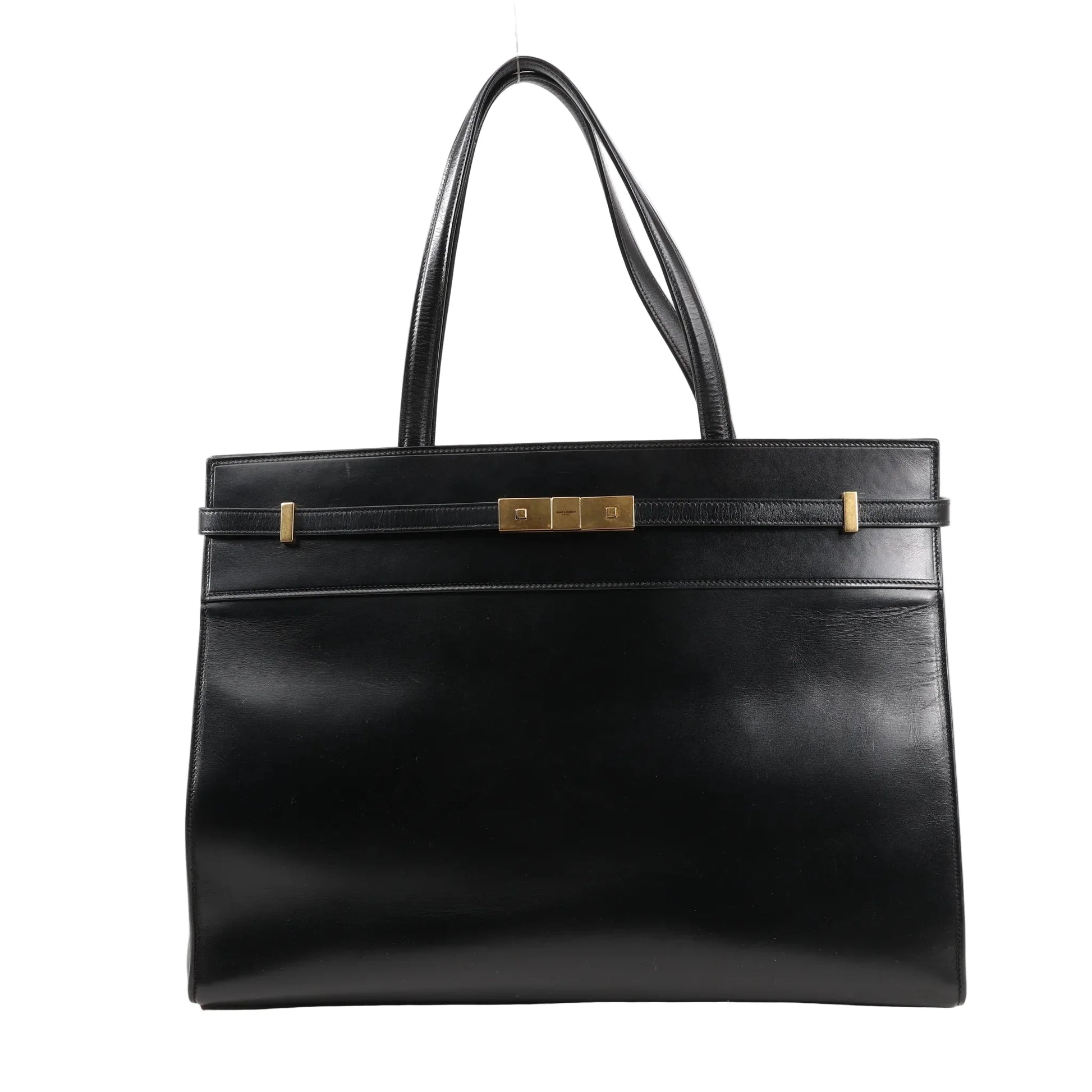 Front view of Saint Laurent Paris Manhattan Tote Bag in black smooth leather, featuring structured silhouette, slim leather strap detail, gold-tone square clasp, and dual leather shoulder handles.
