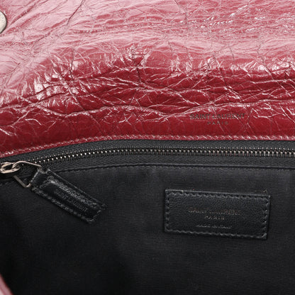 Sac à bandoulière Saint Laurent Paris Niki en cuir bordeaux avec chaîne 498894