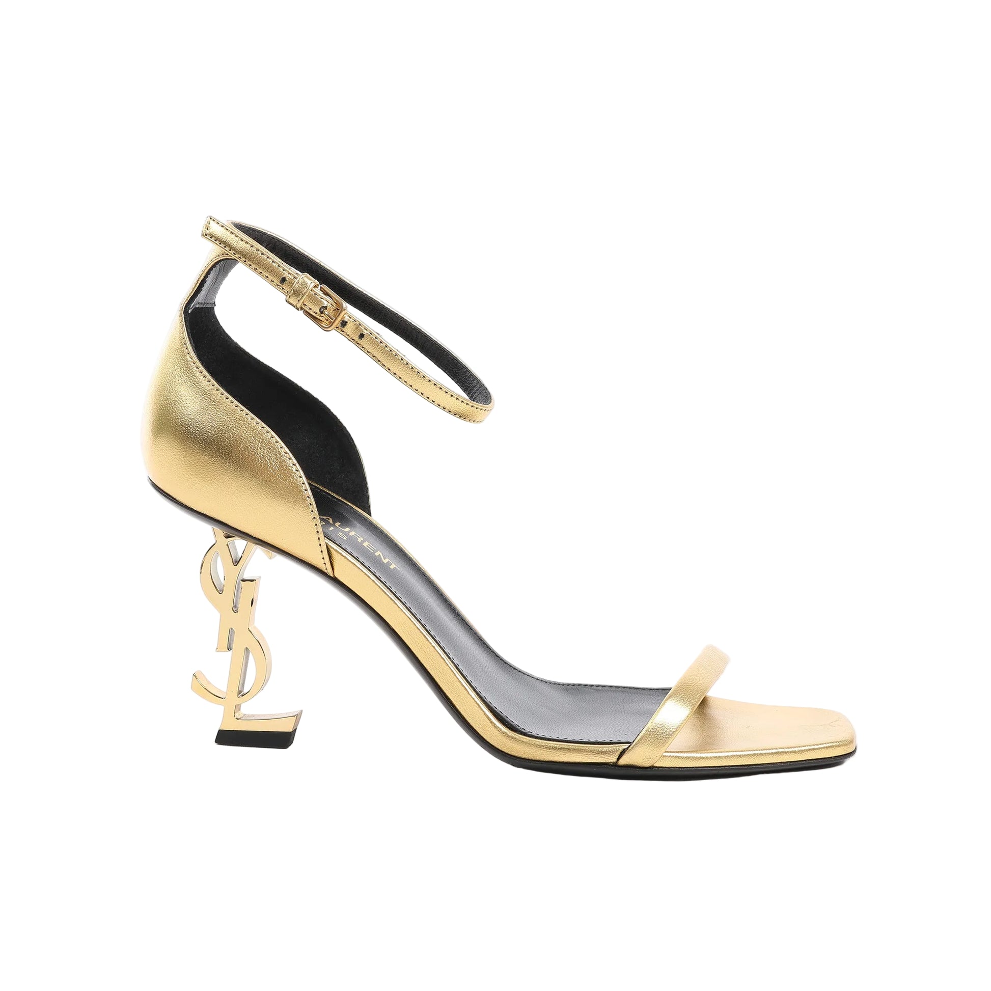 Saint Laurent Paris Opium gold leather heels in size 36.5 EU, featuring a slim ankle strap, open toe, and iconic YSL monogram logo heel, designed in a striking metallic finish for a luxe, modern silhouette.