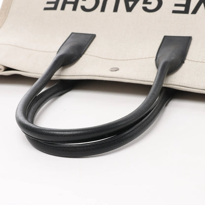 Saint Laurent Rive Gauche Große Tragetasche aus bedrucktem Canvas und Leder in Beige 499290