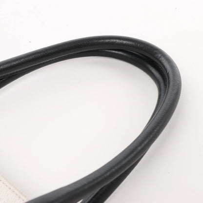 Saint Laurent Rive Gauche Große Tragetasche aus bedrucktem Canvas und Leder in Beige 499290