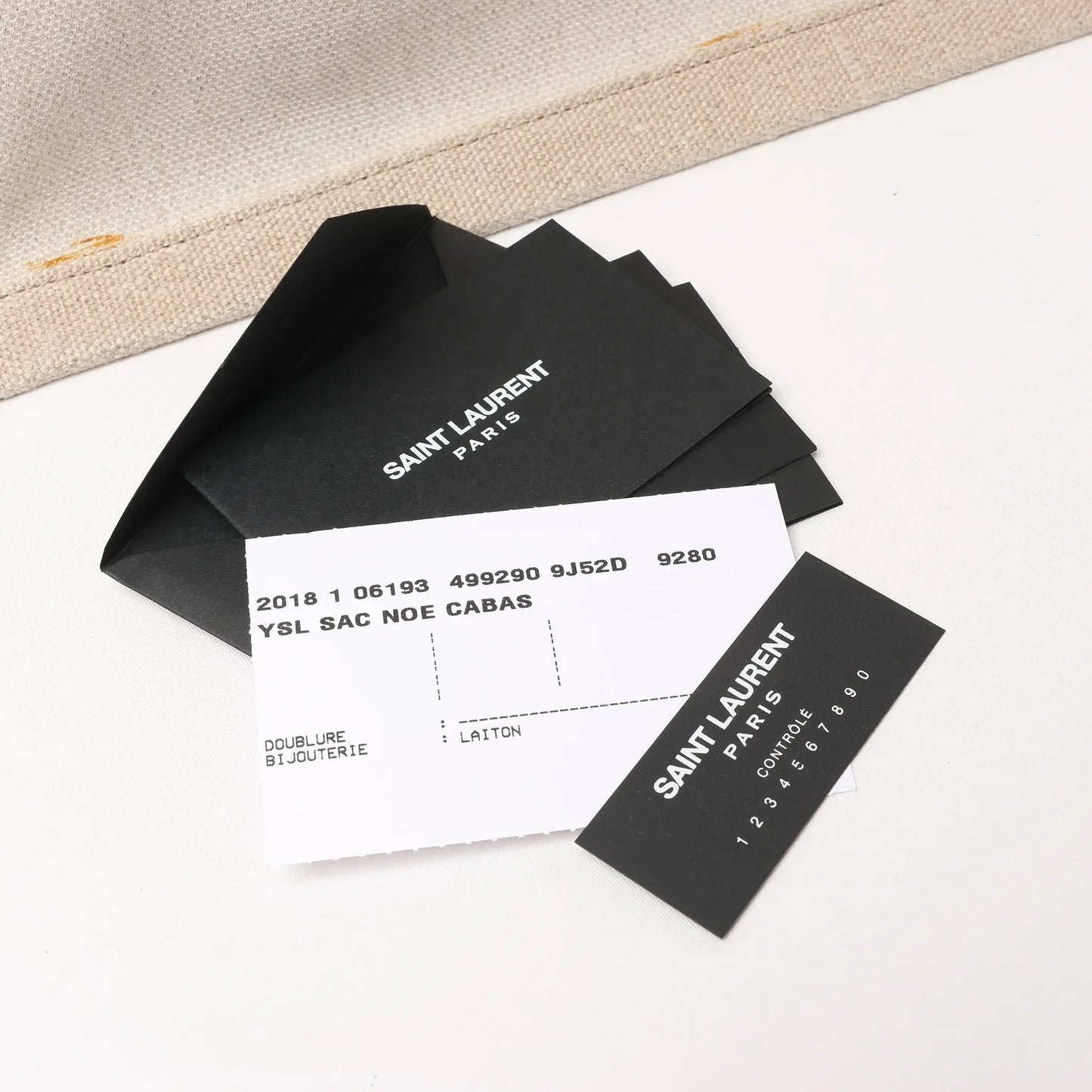 Saint Laurent Rive Gauche Große Tragetasche aus bedrucktem Canvas und Leder in Beige 499290